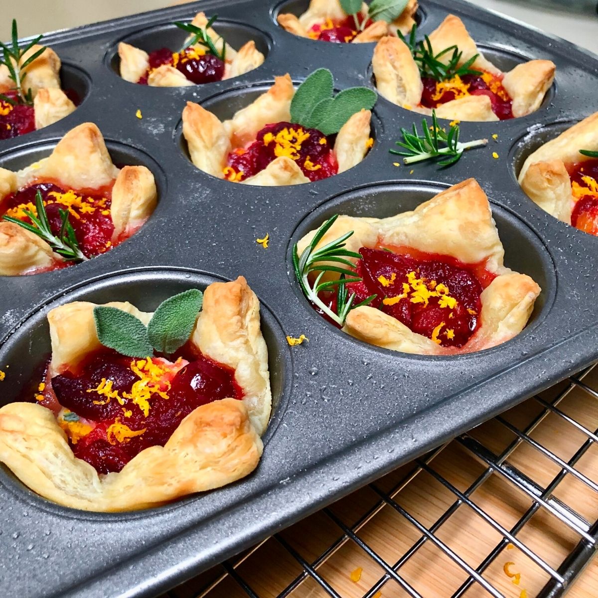 A tray of food with a leaf on top.